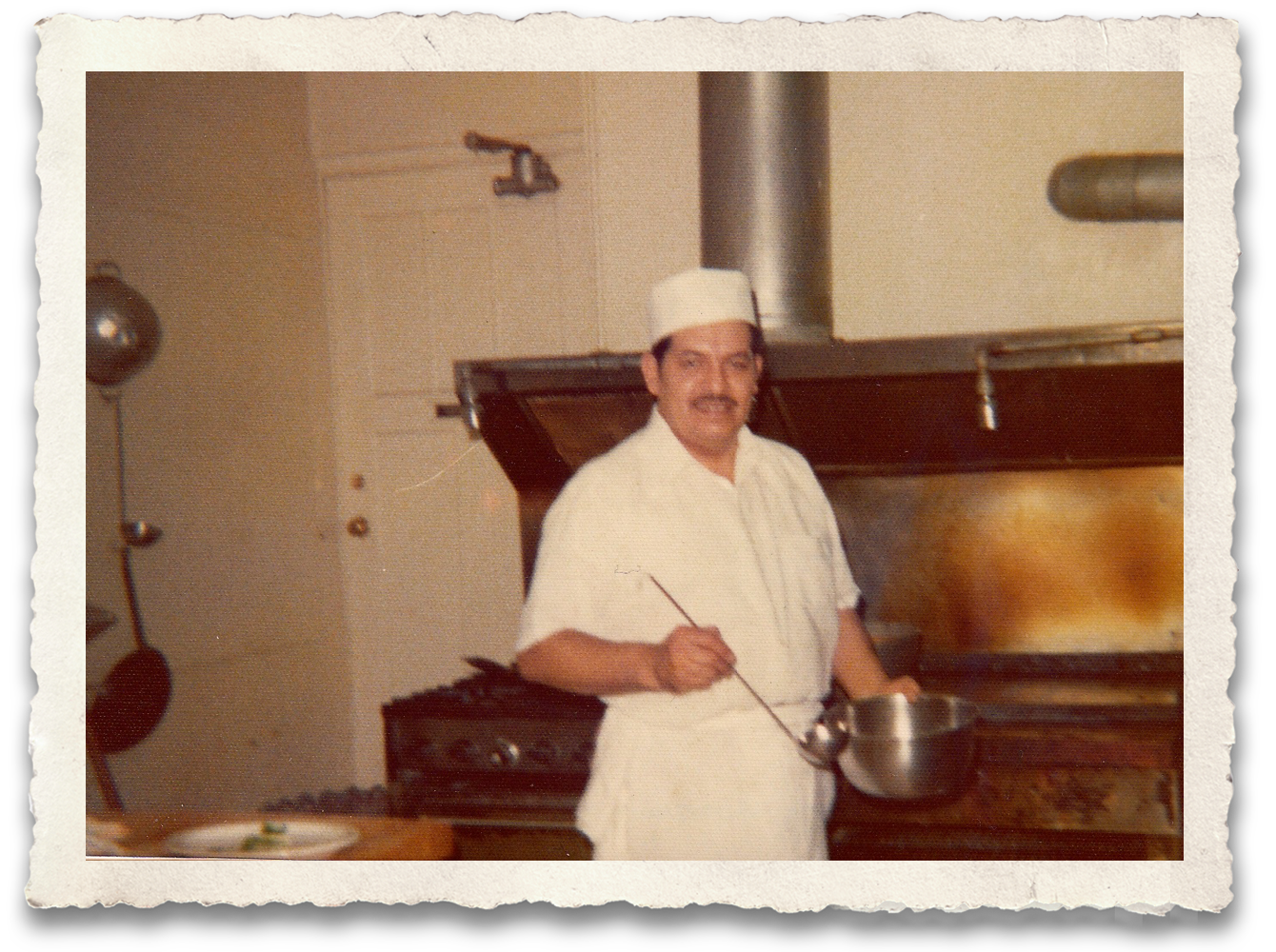 Ramon Cardenas Sr. at work in the kitchen at Red Iguana Ramon Cardenas Sr. at work in the kitchen at Red Iguana